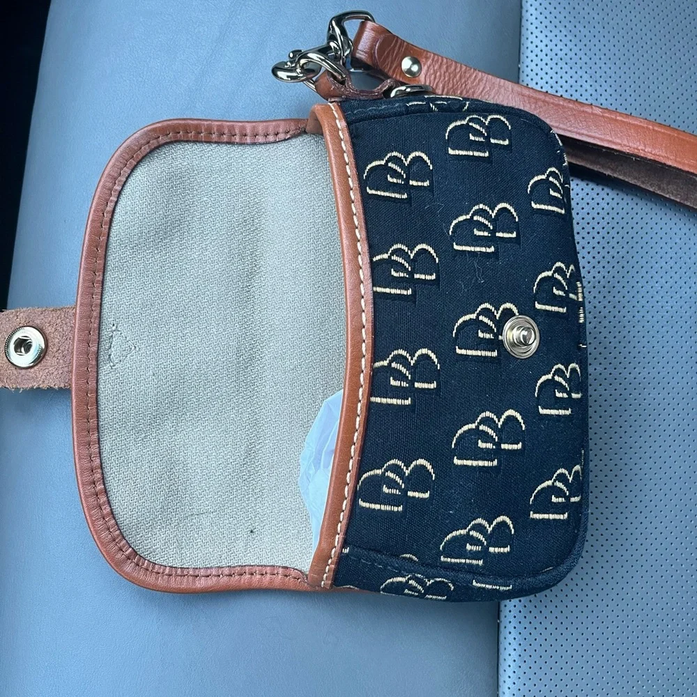 Dooney & Bourke Black and Tan Clutch with silver Accents - Picture 7 of 9